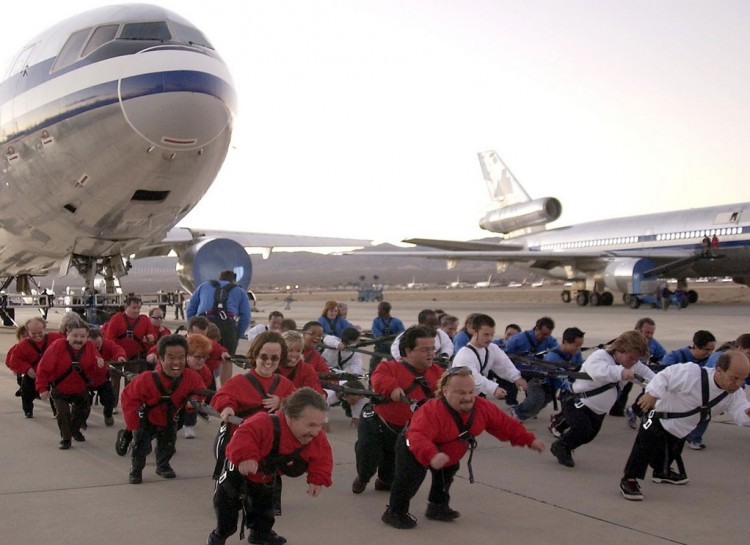 littlePeopleTowingPlane